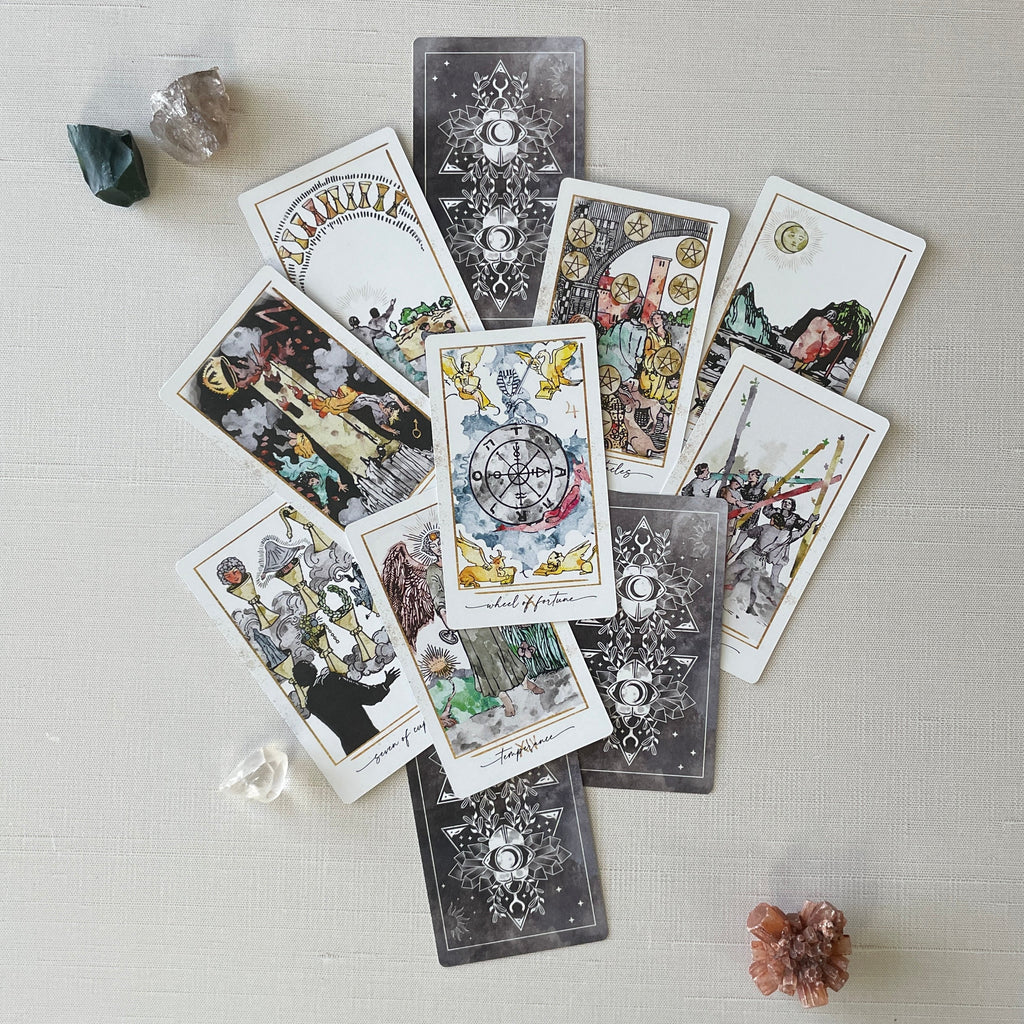 Modern Hue Tarot deck: Rider-Waite-Smith cards recolored in soft watercolor, fanned on a table (image 3)